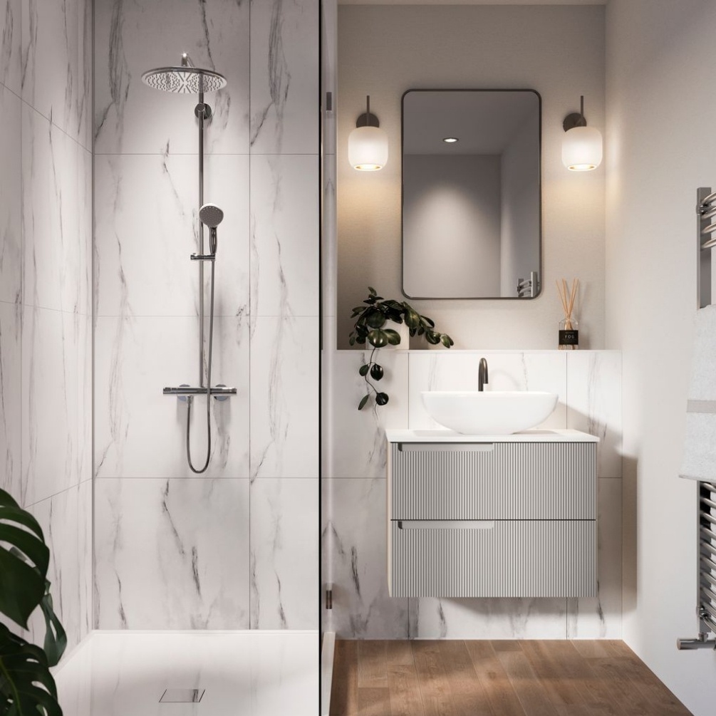 Lifestyle image of the Showerwall Laminate White Marble 2400mm x 600mm Square Tile Effect Wall Panel - SWT08 installed behind a walk-in shower with shower column, and wall hung vanity unit with basin and rectangular mirror